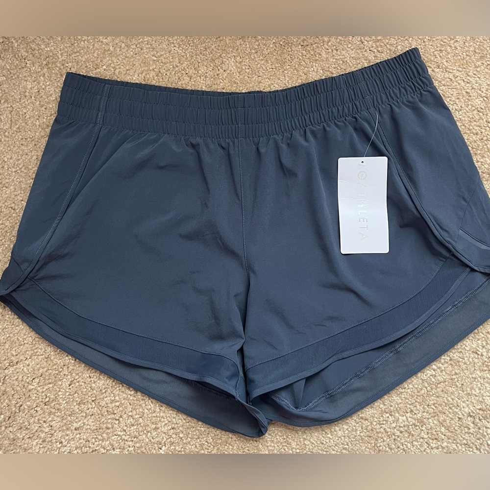 NWT Women’s Mesh Run Racer 4” Short. Size Large, grey-blue color.